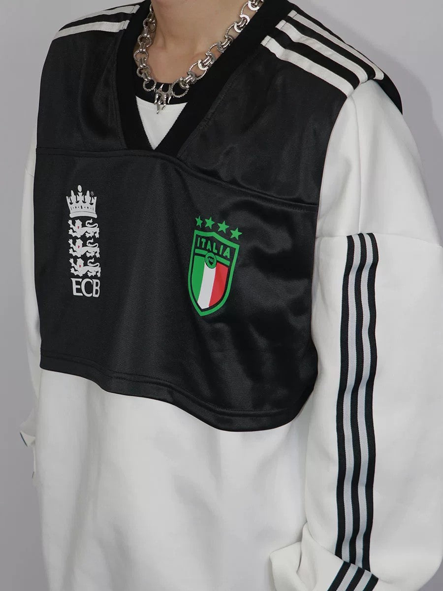 Lifestyle shot of a model wearing the loose fit fake two-piece sweatshirt