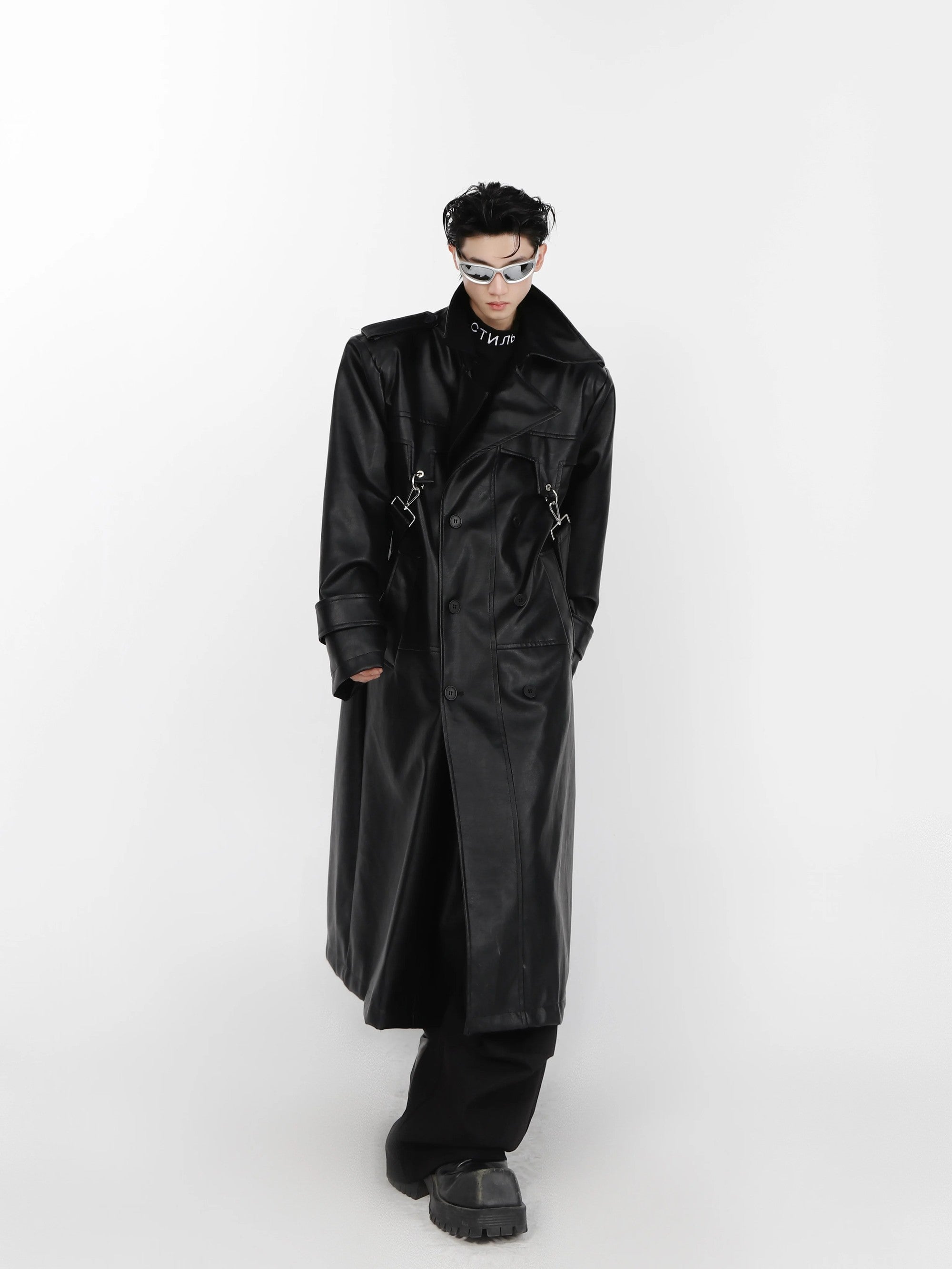 Stylized urban shot of the futuristic punk leather overcoat