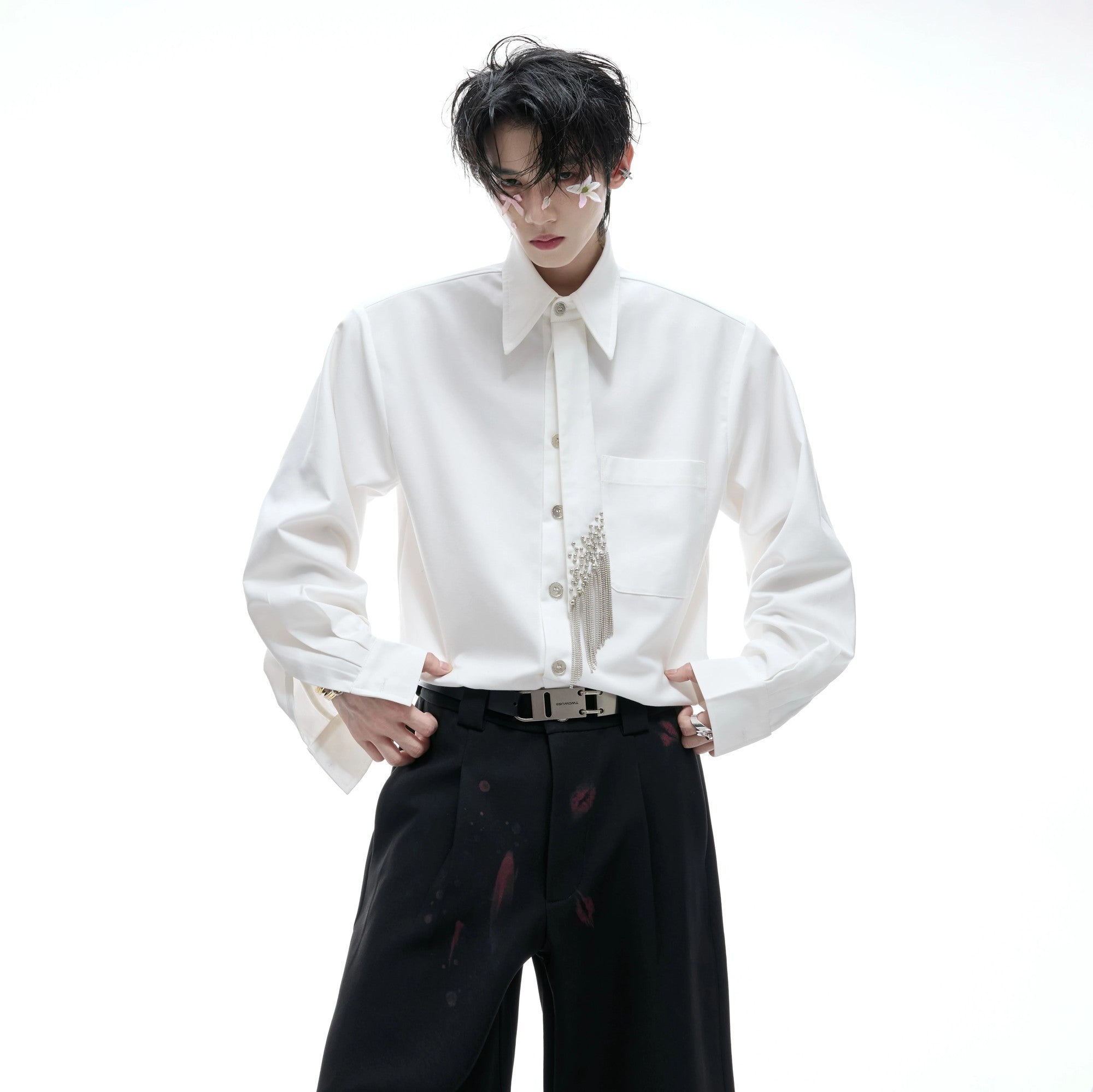 Front view of white oversized shirt with built-in tie and padded shoulders