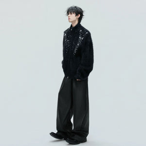 Detail shot of hand-placed pearls on premium wool fabric