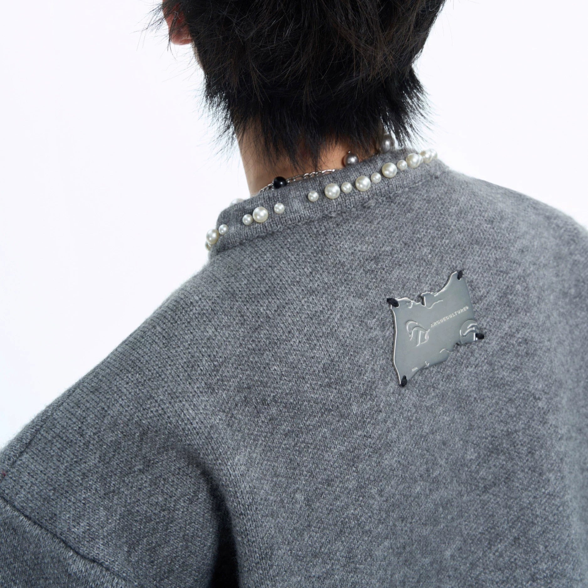 Back view of the loose fit cropped knit cardigan