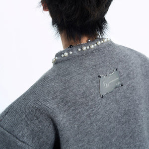 Back view of the loose fit cropped knit cardigan