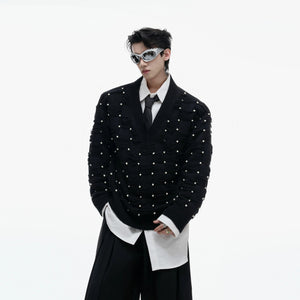 Black heavyweight V-neck sweater with pearl embellishments and fringe detail.