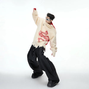 Close-up of the irregular split hem and high-quality knit texture.