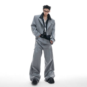 Men's deconstructed pinstripe blazer with denim patchwork details front view