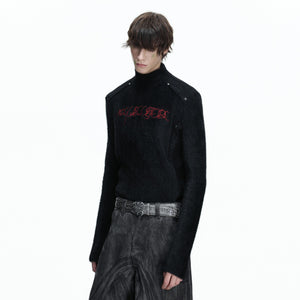 Close up of the deconstructed splicing and embroidery on the chest