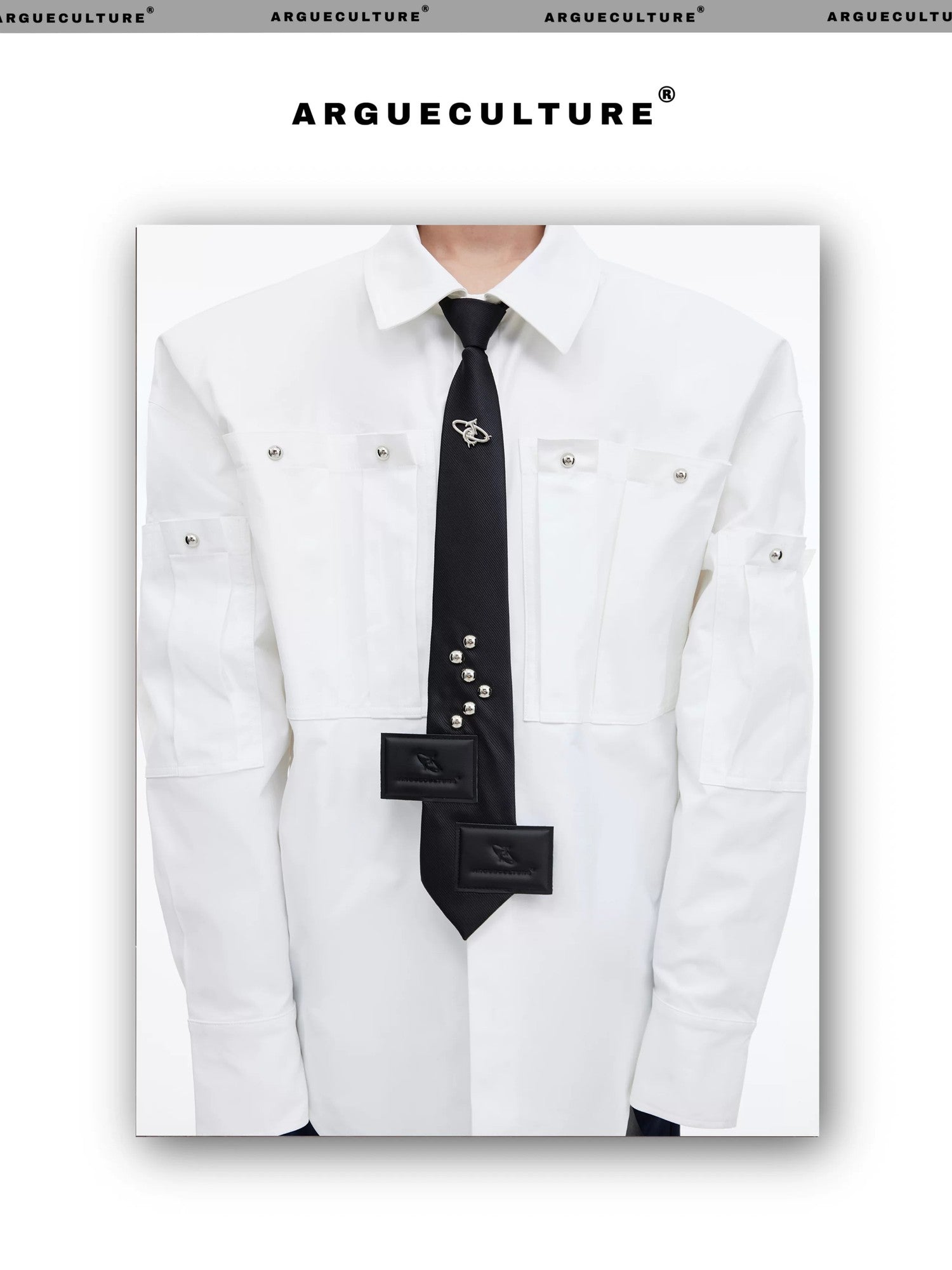 desc::pre-tied-streetwear-tie-with-metal-logo-leather-patch-detail-img-2