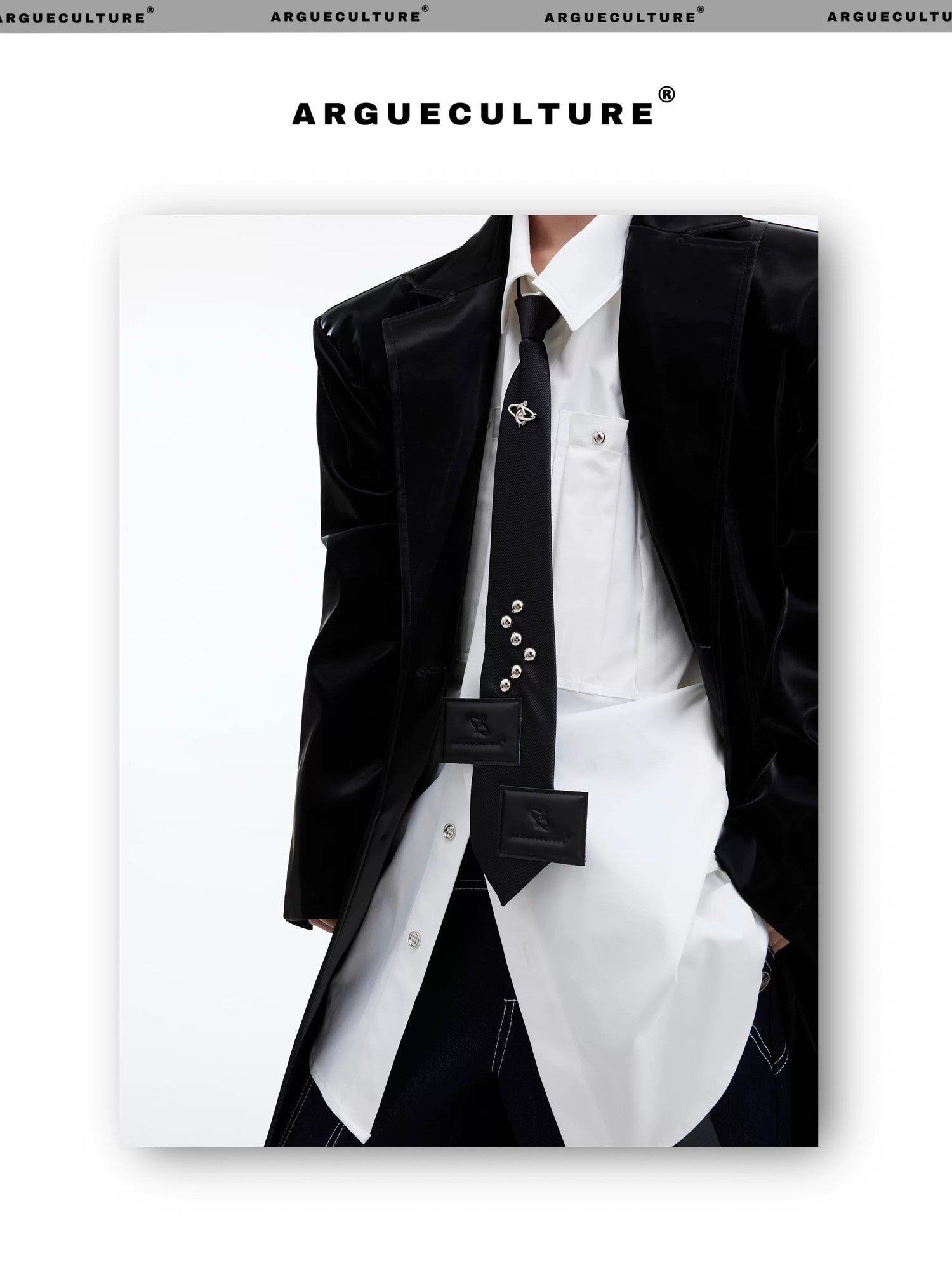 desc::pre-tied-streetwear-tie-with-metal-logo-leather-patch-detail-img-3