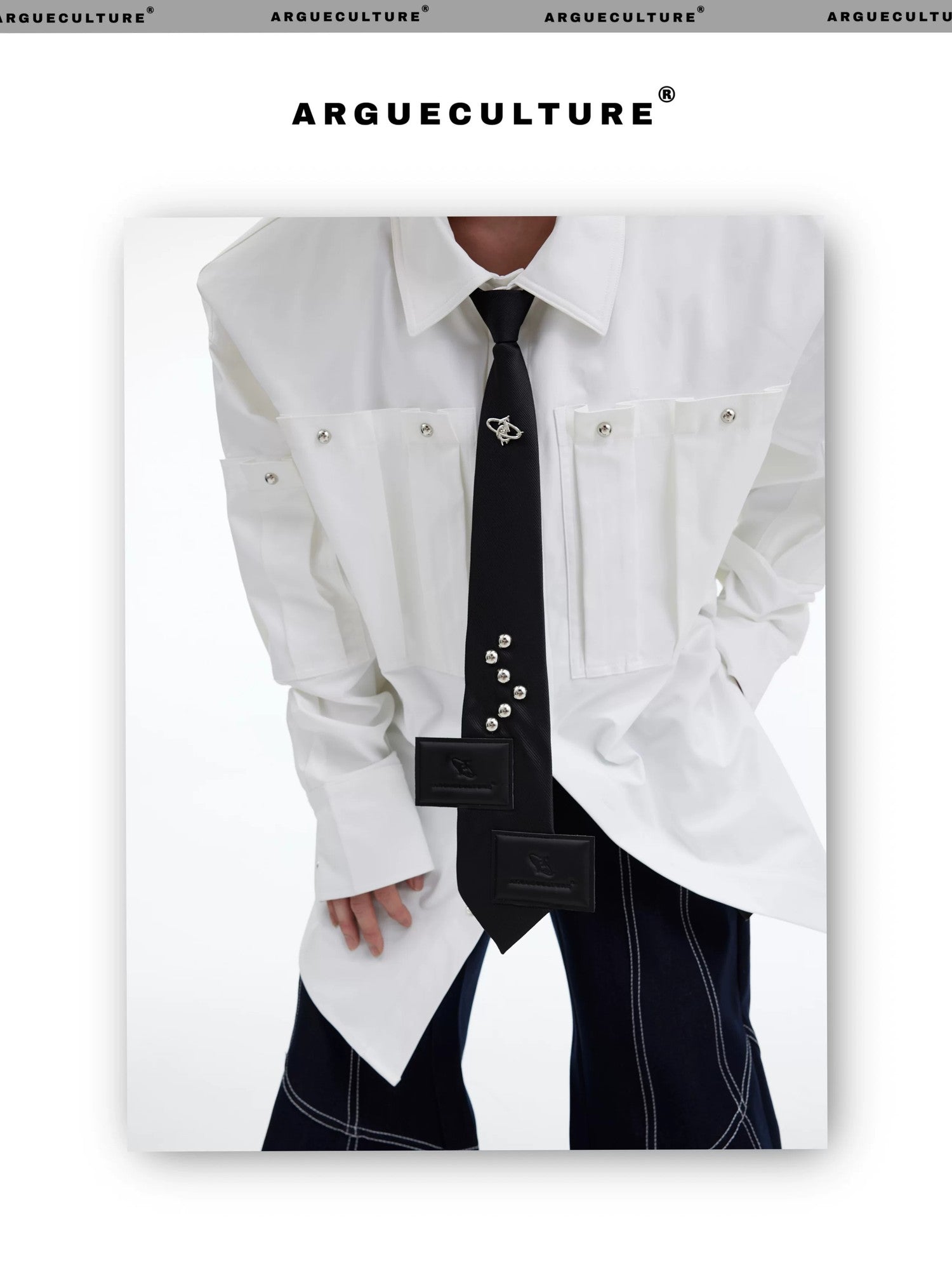 desc::pre-tied-streetwear-tie-with-metal-logo-leather-patch-detail-img-6