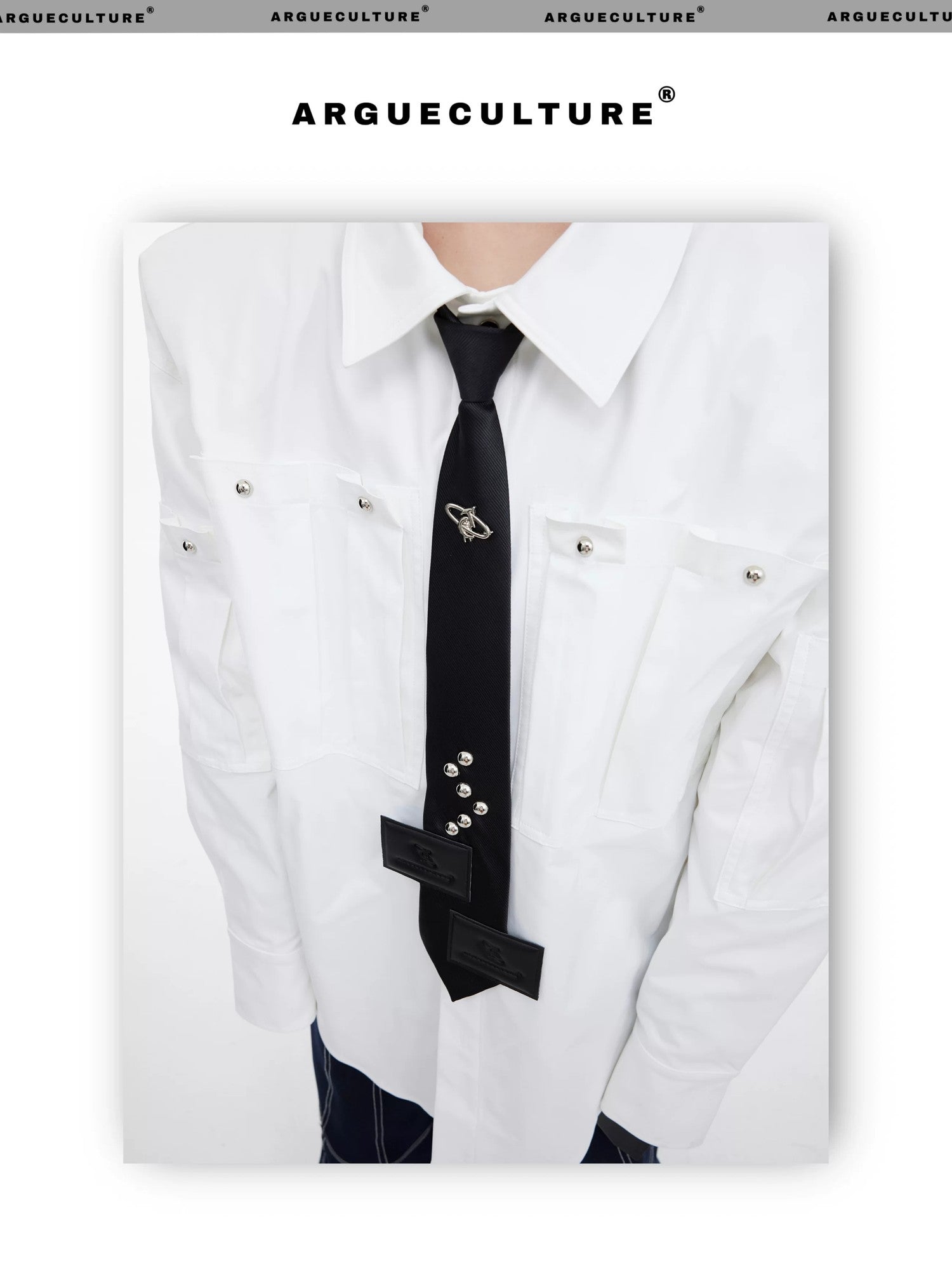 desc::pre-tied-streetwear-tie-with-metal-logo-leather-patch-detail-img-9