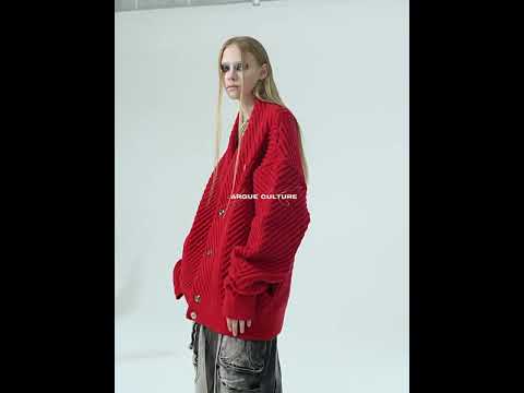 Video showing different ways to style this oversized v-neck knit sweater for urban fashion looks