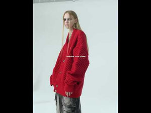 Video showing different ways to style this oversized v-neck knit sweater for urban fashion looks