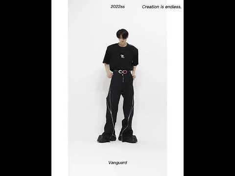360-degree video showcasing the distressed zip-front flared pants from all angles with movement demonstration