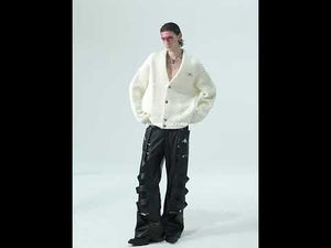 Video showing different ways to style this chunky knit V-neck cardigan for streetwear outfits