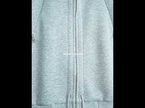 Video demonstration showing various ways to wear and style this oversized hoodie cardigan with dual zippers