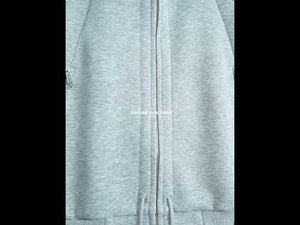 Video demonstration showing various ways to wear and style this oversized hoodie cardigan with dual zippers