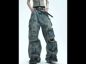 Video showing distressed straight-leg jeans with hand-painted artwork and multiple pockets in motion for urban fashion