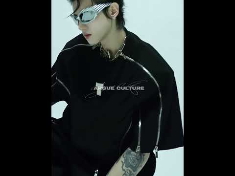 360-degree video showcasing the distressed oversized tee with metal zip details and textured cotton fabric construction