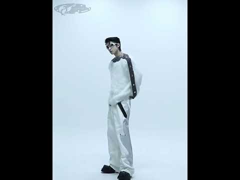 360-degree video showcasing the off-shoulder cable-knit sweater's airplane clasp buttons, drop shoulder design and soft texture