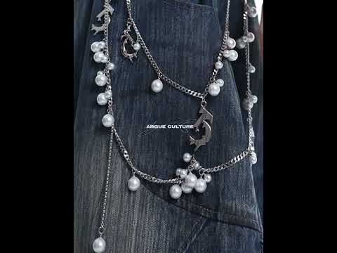 360-degree video showcasing vintage distressed jeans with pearl accents and loose wide leg fit