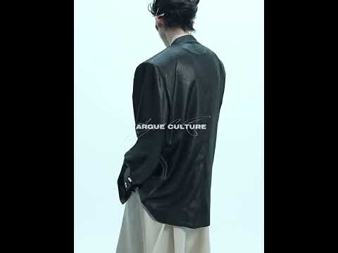 Video showing how the liquid metal textured oversized blazer moves and drapes in streetwear styling