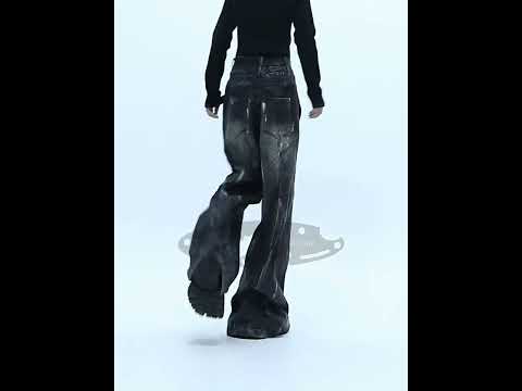 360-degree video showing all angles of vintage distressed wide-leg jeans with handpainted details