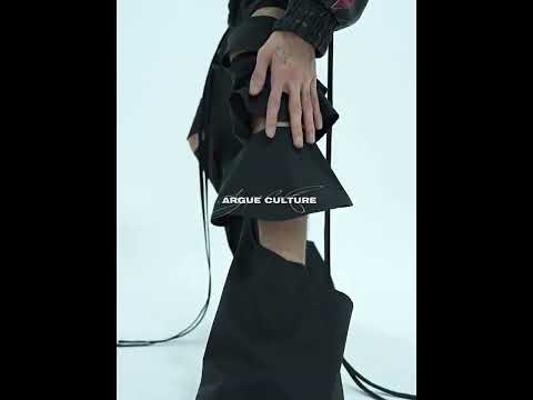 360-degree video showcasing all angles of the distressed cargo pants with cutout design and ribbon accents