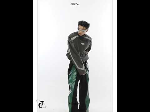 360-degree video showcase of gender-neutral avant-garde hoodie featuring stand collar and bold embroidery details