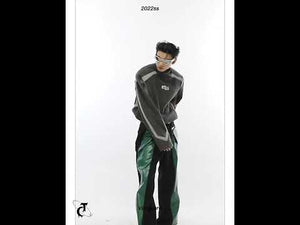 360-degree video showcase of gender-neutral avant-garde hoodie featuring stand collar and bold embroidery details