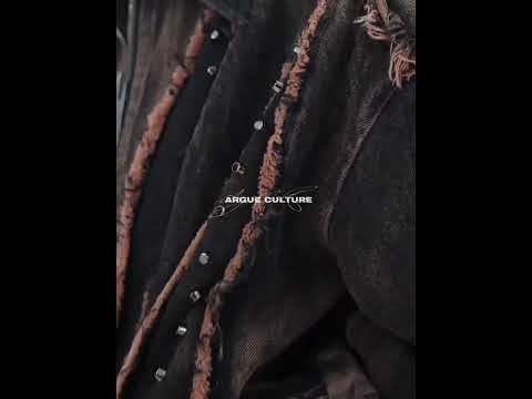 360-degree video showcase of distressed deconstructed denim jacket with fringe and stud details