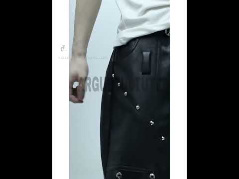 360-degree video showing metal-studded black PU leather pants from all angles with streetwear styling