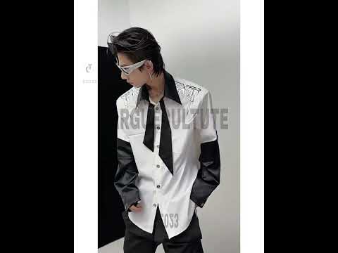 Video showcasing different ways to style this 3D metallic print oversized shirt with built-in necktie detail