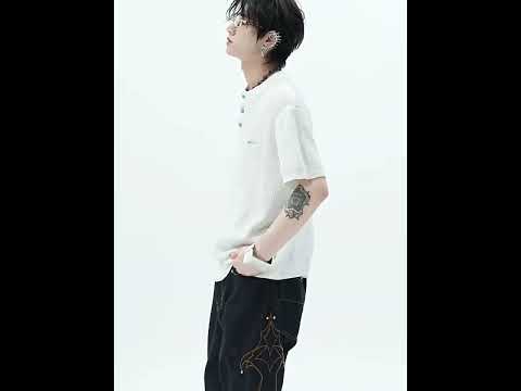 360 degree video showcasing the lightweight crochet knit tee's loose fit and blue gemstone details