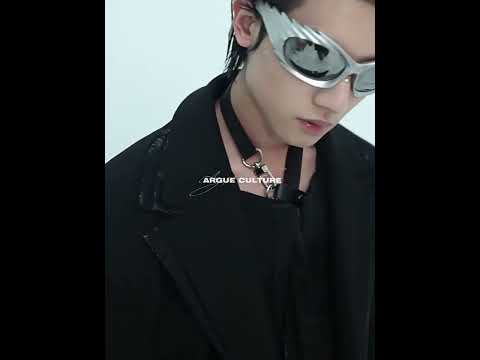 Video showcasing the full deconstructed blazer and pants set in motion, highlighting the irregular collar and loose fit