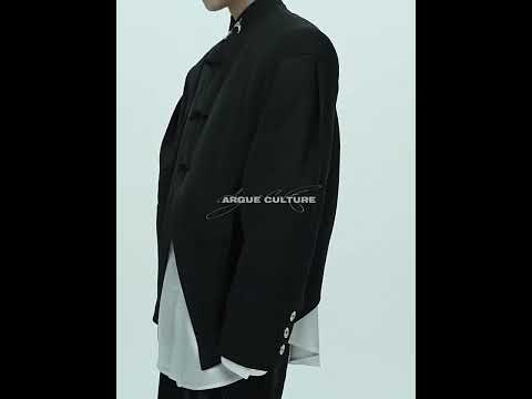 360-degree video showcase of vintage Chinese-inspired leather blazer highlighting stand collar and deconstructed design