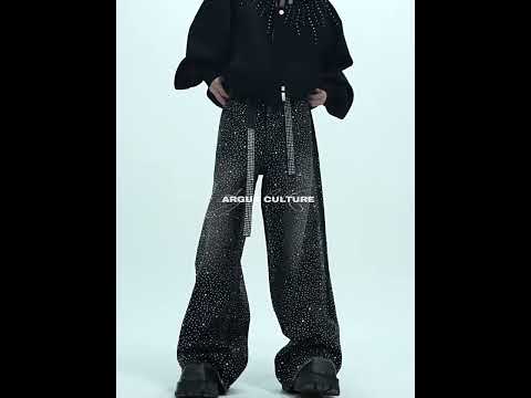 360-degree video showing all angles of vintage washed jeans with star embroidery and distressed details