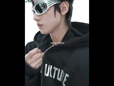360-degree video showcase of the oversized puffer jacket with hood and statement sleeves in motion