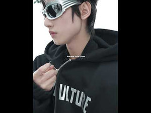 360-degree video showcase of the oversized puffer jacket with hood and statement sleeves in motion