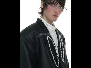 360-degree video showcasing the structured silhouette and pearl embellishments of this peak lapel blazer