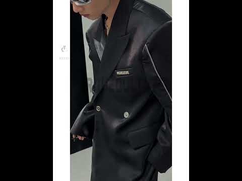 360-degree video showcasing the blazer's liquid metal fabric, zipper details, and how it moves with the wearer.