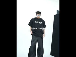 360-degree video showing all angles of the metal-button off-shoulder graphic tee with color-block streetwear design