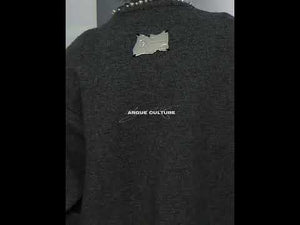 Video showing 360-degree view of the pearl-trimmed cropped cardigan with multiple styling options for street fashion