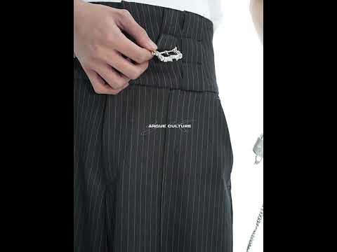 Video showing how to style retro metallic stripe pants with different urban streetwear outfits