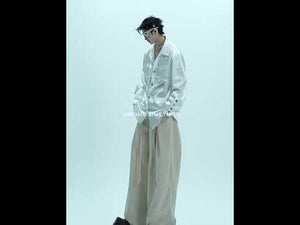 360-degree video showing liquid-silk shirt features including detachable shoulder pads