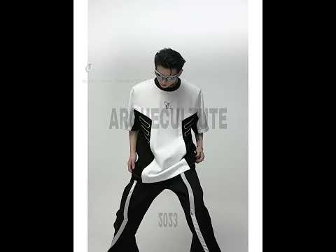 Video showcasing how to style this padded shoulder graphic tee with different urban fashion looks