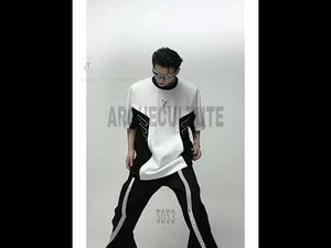 Video showcasing how to style this padded shoulder graphic tee with different urban fashion looks