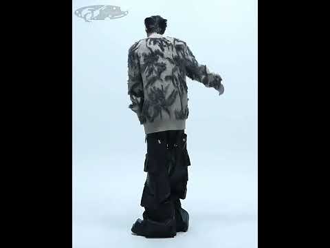 Video showing styling options and fabric details of vintage floral jacquard knit cardigan