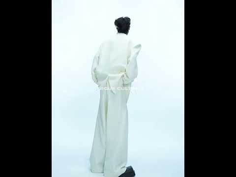 360-degree video showcase of white oversized deconstructed blazer with metal buttons and loose streetwear fit