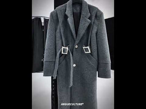 Video showing different ways to style the oversized wool coat with deconstructed waist and metal button details