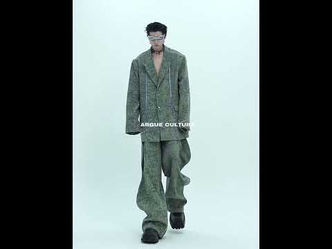 360-degree video showcasing the textured denim jacket with metal zipper and all deconstructed design details